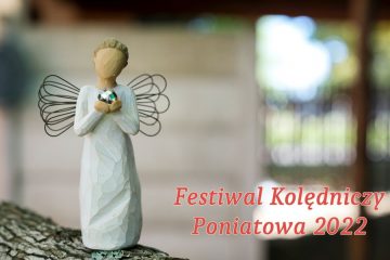 baner festiwalu kolędniczego zdjęcie figurki aniołka z czerwonymi napisami